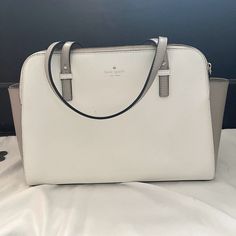 Kate Spade White Leather Tote Bag. Brand New Never Used. It Is White With A Cool Light Tan Color On The Sides. It Has Three Compartments, Two Zippered And One Buttoned. White Formal Tote Bag, White Top Handle Bag For Office, White Top Handle Office Bag, White Crossbody Office Bag, White Office Crossbody Bag, Classic White Satchel For Shopping, White Tote Bag For Office, White Double Handle Satchel For Office, White Bags With Leather Handles For Formal Occasions