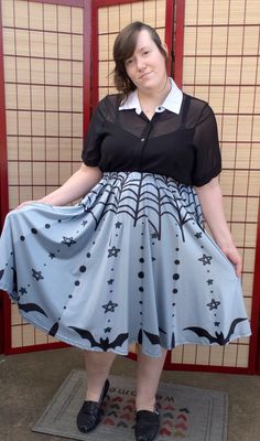 Mid-calf length goth skirt in various shades of gray with black bats, stars and spiderwebs. Very flowing and elegant, this full circle skirt is sure to impress! It has a deep pocket on either seam that can fit a large phone or wallet.  Material is a 90% polyester, 10% spandex blend. This skirt has a weave with a more matte texture, differentiating it from the shinier fabric of our skater skirts.  ~SIZING INFORMATION~ Sizing Chart and Example Sizing photos available at my studio's site here: http Witchy Skirt For Costume Party, Witchy Skirt For Halloween Cosplay, Fairy Grunge Skirt For Halloween Cosplay, Fat Goth, Halloween Street, Goth Skirt, Skater Skirts, Goth Halloween, Mid Calf Skirt