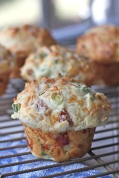 several muffins sitting on top of a cooling rack