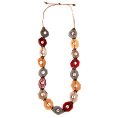 Gorgeous and Eco-friendly long necklace handmade with unique tagua shapes and accented with recycled coconut discs. Adjustable 24"-38" L Materials: Sustainable Tagua nut, Recycled Coconut Shell Wax Cotton cord Organic Vegetable dyes Handmade in Ecuador Due to the nature and size of the tagua nuts, all sizes are approximate…not exact. Colors may vary from the pictures slightly due to the nature of the Tagua Nut. Long Necklace Handmade, Summer Clearance Sale, Tagua Jewelry, Tagua Nuts, Stackable Bracelets, Organic Vegetables, Coconut Shell, Adjustable Necklace, Aruba