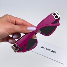 Balenciaga Bb0095s 017 Sunglasses Fuchsia Pink Silver Logo Grey Cat Eye Unisex Brand: Balenciaga Model: Bb0095s Color Code: 017 Gender: Unisex Year: 2023 Frame Colour: Fuchsia Pink Silver Logo Frame Shape: Cat Eye / Oval Frame Style: Full Rim Frame Material: Recycled Acetate Lens Material: Nylon Lens Color: Grey Lens Protection: Category 3 Size: 53x19x135 100% Uv Protection Made In Italy. Full Retail Package With All Accessories: Case, Cloth And All Paperwork. 100% Authentic! Trendy Purple Cat Eye Sunglasses With Uv Protection, Designer Purple Sunglasses With Gradient Lenses, Trendy Purple Cat Eye Sunglasses With Mirrored Lenses, Trendy Purple Mirrored Cat Eye Sunglasses, Elegant Purple Cat Eye Sunglasses, Designer Purple Sunglasses With Tinted Lenses, Luxury Purple Sunglasses With Gradient Lenses, Designer Purple Tinted Sunglasses, Luxury Purple Sunglasses With Mirrored Lenses