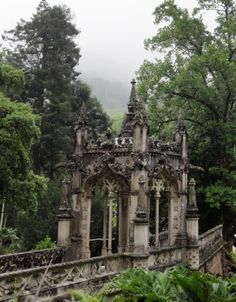 an old building in the middle of some trees