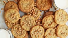 some cookies and milk are on a table