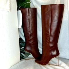 This Is A Rare Gem To Find Brand Spanking New! The Iconic Margiela Maison H&M Boot.. These Have Never Even Been Tried On.. These Are Not Big Calves Friendly I Sooo Wish They Were And I Thought I’d Take Them To A Cobbler But I Just Can’t Bring Myself To Have Them Cut Altered Etc..Such A Staple Statement Boot I Cannot Budge Much On My Price As I Purchased These From Overseas Also I’ll Have To Buy An Overweight Label So Please Keep That In Mind If Or When You Send An Offer These Are Listed On Anoth Modern Pointed Toe Wedge Boots For Fall, Brown Leather Pointed Toe Wedge Boots, Trendy Leather Wedge Boots With Pointed Toe, Chic High Heel Wedge Boots With Reinforced Heel, Modern Wedge Heel Boots For Fall, Chic High Ankle Wedge Boots With Reinforced Heel, Elegant Wedge Heel Boots For Fall, Elegant Fall Wedge Heel Boots, Modern Wedge Boots With Reinforced High Heel