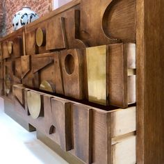 a close up of a wooden dresser with drawers