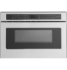 a stainless steel microwave oven with the door open and electronic controls on it's side