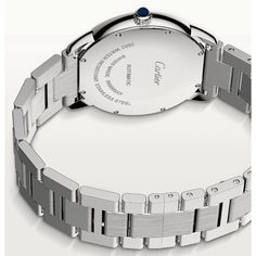 Ronde Solo de Cartier watch, 42 mm, mechanical movement with automatic winding. Steel case, beaded crown set with a synthetic cabochon-shaped spinel, silvered opaline dial, blued-steel sword-shaped hands, sapphire crystal, steel bracelet, calendar aperture at 3 o'clock. Thickness: 8.53 mm. Water-resistant to 3 bar (approx. 30 meters/100 feet). Beaded Crown, Cartier Watch, Store Hours, Blue Steel, Mechanical Movement, 3 O Clock, Watches Jewelry, Selling Jewelry, Italian Charm Bracelet