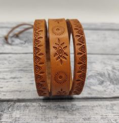 The leather bracelet with stamped pattern. Vegetable tanned leather. Handstamped Bracelet, Stamped Bracelet, Leather Wristbands, Leather Crafts, Craft Accessories, Vegetable Tanned Leather, Bracelet Gift, Leather Craft, Gift For Him