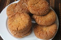 a white plate topped with cookies on top of a table