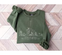 A Thrill Of Hope The Weary World Rejoices Sweatshirt, Christian Christmas Sweatshirt, Nativity Scene Sweater, Christmas Jesus Nativity Shirt WARNING -READ BEFORE ORDERING- REMEMBER: - The design is a Direct-to-Film (DTF) print. -You may refer to the size chart for precise measurements as all our sizes are unisex. There may be differences in sizes among brands. -Feel free to contact us if you have any issues about the things (sizes, shirt colors, design text colors, etc.). -Please be aware that we use different brands. Circle, Bella Canvas, Gildan Softstyle, Smart, Next Level, and Rustic United are a few examples. A few of these brands are comparable to one another. We are using other brands due to a scarcity of supply so that no orders are held back! -If you want sweatshirts and hoodies fr The Weary World Rejoices, A Thrill Of Hope, Thrill Of Hope, Sweatshirt Details, Jesus Tees, Christmas Jesus, Christian Sweatshirt, Religious Christmas, Holiday Sweatshirt