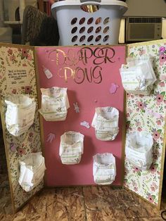 a baby shower stall with toilet paper on it