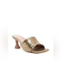 Vicenza Metallic Square-Toe Mules From Vicenza Featuring Gold-Tone, Leather, Metallic Effect, Open Toe, Square Toe, Slip-On Style And Low Heel. Material: Outer: Leather 100% Sole: Leather 100% Lining: Rubber 50%, Leather 50% Slip-On Styling Imported Dimensions: Heel Height: 2" Fitted Gold Heels With Square Toe, Gold Fitted Square Toe Heels, Gold Fitted Kitten Heels For Spring, Spring Gold Kitten Heels With Padded Heel, Gold Spring Kitten Heels With Padded Heel, Gold Kitten Heels With Sculpted Heel For Spring, Fitted Gold Heels With Padded Heel, Chic Gold Kitten Heels For Spring, Designer Summer Party Kitten Heels