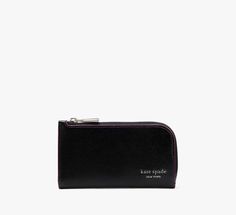 Reach for our Devin slim wallet on repeat. It’s made from scratch-resistant patent Saffiano leather so it’ll keep its glossy look for years to come. | Kate Spade Devin Glitter Edge Small Slim Bifold Wallet, Black Chic Kate Spade Bifold Wallet, Luxury Leather Kate Spade Wallet, Kate Spade Leather Wallet With Zipper Closure, Kate Spade Black Leather Wallet, Black Kate Spade Wallet, Kate Spade Wallet, Slim Wallet, On Repeat, Women's Accessories