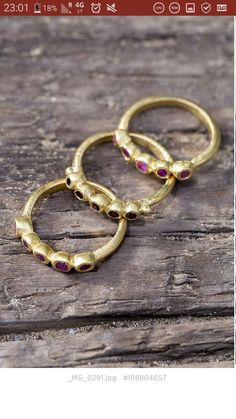 Gold Stackable Rings With Ruby Bezel Setting, Gold Stackable Rings With Pink Sapphire, Gold Stackable Ruby Ring, Ruby Stackable Jewelry For Promise, Stackable Ruby Jewelry For Promise, Stackable Gold Ruby Rings, Gold Stackable Ruby Birthstone Ring, Fine Jewelry Stackable Ruby Promise Ring, Ruby Stackable Promise Ring