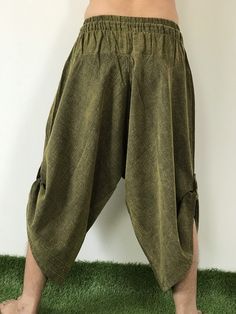 "Male Model Tall 5'9\" Waist 34\" Samurai Pants - elastic waistband, Unisex pants, beautiful casual pants is unique & comfortable to wear Handmade with a very lovely pattern, it is easy to wear and great for many occasions. One size fits most. These pants are great for many different activities like traveling, dancing, going to festivals, rock climbing, yoga, meditation, massage, working out, martial arts, Taichi MATERIAL: 100% Cotton APPROX MEASUREMENT: Waist: 24\"- 40\" Length: 27\" (Refer Bohemian Harem Pants With Straight Leg, Casual Harem Bottoms For Meditation, Traditional Style Baggy Pants For Spring, Traditional Baggy Pants For Spring, Traditional Baggy Bottoms For Spring, Casual Wide Leg Harem Pants For Yoga, Hippie Cotton Bottoms For Meditation, Casual Yoga Harem Pants Wide-leg, Casual Wide-leg Harem Yoga Pants