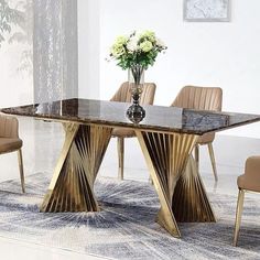 an elegant dining table with gold leaf legs and marble top is featured in this ad for nordic simpl city