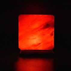 a red light sitting on top of a table