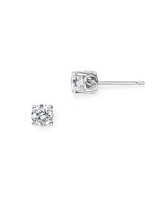 Diamond stud earrings in white gold. Elegant Platinum Earrings With Single Diamond, Elegant 14k White Gold Earrings With Single Diamond, Classic White Gold Earrings With Single Diamond, White Gold Earrings With Single Diamond For Formal Events, Formal Silver Earrings With Single Diamond, Formal White Gold Earrings With Single Diamond, Formal 14k White Gold Earrings With Single Diamond, Formal 14k White Gold Single Diamond Earrings, White Gold Solitaire Earrings In Sterling Silver