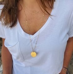 This large 14k gold fill or sterling silver necklace is perfect for layering! The 25mm charm is hammered to give a fun effect, and catch the light. It is paired with our flashy gold flattened chain to add even more sparkle! Shown here in 30 inch lengths. *If you are unsure of the length you need, or would like to wear this item at different lengths, we now offer an adjustable length option! You can add an adjustable end to your necklace using this link: https://www.etsy.com/listing/791277751/nec Everyday Hammered Medallion Jewelry, Everyday Minimalist Hammered Coin Necklace, Gold Sterling Silver Medallion Necklace For Everyday, Everyday Gold Sterling Silver Coin Necklace, Everyday Gold Coin Necklace In Sterling Silver, Everyday 14k Gold Filled Necklaces With Coin Pendant, Everyday 14k Gold Filled Coin Pendant Necklaces, Everyday Yellow Gold Necklace With Large Pendant, Everyday 14k Gold Filled Coin Pendant Necklace