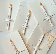 four birthday cards with matches on them, one has a candle and the other says happy birthday