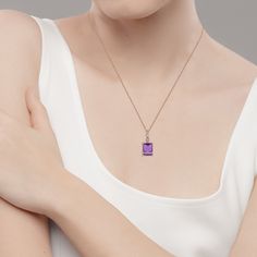 Enhance any wardrobe with this beautiful Amethyst and White Topaz pendant necklace. This necklace showcases a genuine natural 9x7mm emerald-cut Amethyst and White Topaz accent stones. Crafted of 10k Rose Gold and hanging from an 18 inch rope chain, this piece is a wonderful addition to your jewelry collection. Elegant design highlights center birthstone Amethyst (other gemstone colors available) 9x7mm emerald-cut Amethyst Center White Topaz Accent Genuine Natural Gemstones, Solid 10k Rose Gold, Halo Jewelry, Green Gemstone Necklace, Blue Topaz Pendant Necklace, Blue Gemstone Necklace, February Birthstone Jewelry, Emerald Necklace Pendant, December Birthstone Jewelry, Amethyst Necklace Pendant, March Birthstone Jewelry