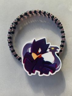 ❣️ Please check out my shop page for current shipping times, shop updates, and coupon codes! ❣️ Go beyond PLUS ULTRA! This adorable silver plated wrap bracelet features our favorite emo bird boy! Memory wire is awesome because it always retains its shape. The planar resin is approximately 1.5 inches at the tallest point, and 2 inches wide at the widest point. The plastic bail is attached via e6000 glue. The seed beads are made of glass. The second photo shows the size comparison of the planar resin and a quarter. If you have any questions, please do not hesitate to ask! Please read my policies section before purchasing. Thank you so much for looking, and have a wonderful day! ⚜️ FREE GIFT WITH EVERY PURCHASE! THE MORE YOU BUY, THE MORE YOU GET! ⚜️ *NOTE: Due to light and screen differences Go Beyond Plus Ultra, E6000 Glue, Plus Ultra, Size Comparison, Memory Wire, Free Gift, Coupon Codes, Wrap Bracelet, Favorite Jewelry