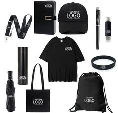 the contents of a black and white fashion set including a t - shirt, bag, pen, headphones, sunglasses, umbrella, lanyard