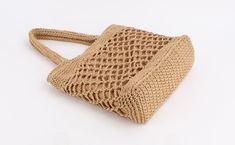 Shape: Casual ToteHandbags Type: Shoulder BagsTypes of bags: Shoulder & HandbagsOrigin: CN(Origin)Main Material: StrawClosure Type: OPENHardness: SOFTExterior: NONEStyle: BohemianLining Material: PolyesterOccasion: partyGender: WOMENPattern Type: KnittingNumber of Handles/Straps: TwoInterior: Cell Phone PocketDecoration: Hollow OutItem Type: HandbagsStraw Bag: Bag for WomenShoulder Bag: Women Shoulder BagsWomen Bag: Summer Travel Bag Square Light Brown Bags For Shopping, Square Light Brown Shopping Bag, Square Light Brown Shopping Bags, Casual Light Brown Satchel For Shopping, Light Brown Square Shoulder Bag For Shopping, Light Brown Rectangular Shopping Bag, Eco-friendly Beige Satchel Shoulder Bag, Eco-friendly Beige Shoulder Satchel, Trendy Camel Bags With Large Capacity