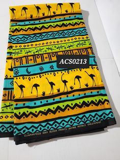 DESCRIPTION Yellow, Black and Green Tribal African Ankara Fabric. This is high quality African print is 100% cotton and it's 45 inches wide. It is used for making African Clothing, African quilts, & For Home decoration. FYI: Print is Double sided. The listing is for 2yards, 6yards and Headwrap For Each piece of fabric measures: 70-72in by 45in for 2yards 105-108in by 45in for 3yards 70in by 22in for Headwrap If you purchase more than one yard, you will receive one continuous piece. *If you requi Traditional Cotton Batik Print Digital Prints, Black Printed Cotton Patterns, Traditional Patterned Cotton Digital Prints, Black Fabric With Traditional Patterns, Traditional Black Fabric With Block Print, Traditional Black Block Print Fabric, Traditional Black Fabric With Traditional Patterns, Traditional Multicolor Cotton Digital Prints, African Quilts