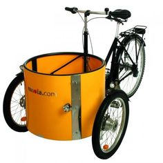 an orange bike with a basket attached to it