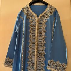 Moroccan Authentic Hand Made Caftan In A Chic Classy Blue- Comes With Belt In Gold. Size Would Fit A M/L But It’s Not Too Loose If You’re A Size Small Blue Long Sleeve Thobe For Eid, Elegant Blue V-neck Kurta, Festive Royal Blue Kaftan, Elegant Long Sleeve Blue Thobe, Blue Embroidered Thobe For Wedding, Embroidered Blue Long Sleeve Abaya, Embroidered Blue Thobe For Wedding, Festive Blue Kaftan For Eid, Blue Embroidered Wedding Thobe