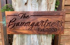 a wooden sign that says the barngoats est 2009