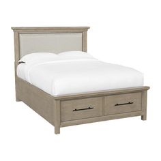 a bed with two drawers underneath it and a white bedspread on the bottom