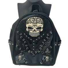 (7-202) Brand New With Tag - Black Embroidered Skull Backpack 2 Side Pockets Top Carrying Handle Back Has Open Pocket Plus A Zipper Conceal Carry Compartment Adjustable Strap Soft Top Quality Leatherette Material Width Is 12" Length Is 11" All Measurements Are Approximate. Please See Photos. Please Remember That Colors Vary Sometimes Due To Lighting Conditions And Can Look Different Depending On Your Screen (Which Means That The Actual Item May Be Lighter Or Darker Than It Appears On Your Device Black Skull-shaped Bag With Skull Print, Casual Black Bags With Skull Print, Pocket Top, Soft Tops, Dog Friends, Adjustable Straps, Tags, Dog Cat, Bag Lady