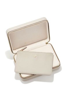 Protect your pieces in style with this luxurious Medium Taupe zip jewelry case by Kendra Scott. Its elegant design and secure zip closure ensure your jewelry stays organized and safe while on-the-go. Perfect for all your favorite Kendra Scott accessories. Elegant Jewelry Storage For Travel, Elegant Gold Rectangular Jewelry Storage Case, Elegant Compact Travel Jewelry, Elegant Gold Jewelry Storage For Travel, Elegant Gold Round Case Jewelry Storage, Elegant Compact Jewelry Storage For Everyday Use, Elegant Rectangular Jewelry Storage For Everyday Use, Elegant Rectangular Jewelry Storage, Luxury Gold Rectangular Jewelry Storage