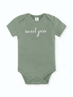 100% Organic cotton infant bodysuit in our Sweet Pea print. Tykes Corner uses certified organic baby clothing so Moms can feel at ease knowing our clothing is free of harmful chemicals and dyes. Sized 0-3, 3-6, 6-12, 12-18 months. Machine wash cold / Tumble Dry Low Remember to support small on your baby registry! Copy and paste the link or click on the Etsy icon in your Babylist app and search Tykes Corner. Green Fitted Casual Onesie, Green Cotton Onesie For Spring, Casual Green Cotton Onesie, Summer Organic Cotton Onesie For Loungewear, Organic Cotton Fitted Bodysuit For Loungewear, Green Cotton Bodysuit For Spring, Spring Organic Cotton Fitted Bodysuit, Playful Green Cotton Onesie, Fitted Short Sleeve Organic Cotton Bodysuit For Summer