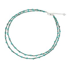 This necklace by Somluck Komolmith features two narrow strands of gemstones in exotic shades of blue that flow gracefully around the neck. Calcite and reconstituted turquoise mingle with beads of faceted pyrite. The necklace fastens with a sterling silver clasp. Reconstituted turquoise, dyed calcite, pyrite, sterling silver clasp Spring ring clasp Handmade in & fairly traded from Thailand Turquoise Gemstone Multi-strand Necklace, Turquoise Multi-strand Gemstone Necklace, Turquoise Multi-strand Gemstone Necklaces, Bohemian Faceted Turquoise Beaded Necklaces, Adjustable Double Strand Faceted Necklaces, Adjustable Double Strand Faceted Necklace, Bohemian Faceted Turquoise Necklaces, Faceted Turquoise Bohemian Necklaces, Faceted Turquoise Crystal Necklaces For Jewelry Making