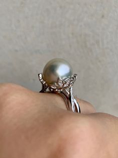 Excited to share this item from my #etsy shop: White south sea pearl ring grade. S925 sterling silver ring white gold plated. Seawater pearl. White pearl #southseapearl #seawaterpearl #indonesianpearl #australianpearl #naturalpearl #genuinepearl #sterlingsilver #pearlring Exquisite White Gold Akoya Pearl Ring, Luxury Silver Pearl Ring For Wedding, Elegant Silver Akoya Pearl Rings, Silver Akoya Pearl Ring In Fine Jewelry Style, Elegant Formal Pear-shaped Pearl Ring, Elegant Pear-shaped Pearl Ring For Formal Occasions, Exquisite White Akoya Pearl Ring, Silver Akoya Pearl Ring For Anniversary, Silver Akoya Pearl Drop Ring