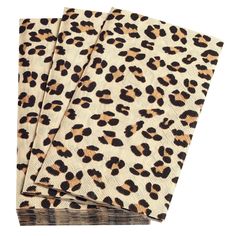 three napkins with leopard print on them