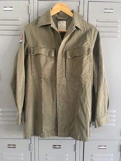 Army shirt/jacket Thrifted in LA Very good condition! Size S/ Unisex Military Style Long Sleeve Tops For Fall, Khaki Long Sleeve Utility Top, Uniform Style Long Sleeve Outerwear With Pockets, Uniform Style Outerwear With Pockets, Long-sleeved Uniform Outerwear With Pockets, Winter Military Long Sleeve Tops, Winter Military Collared Tops, Winter Military Style Long Sleeve Tops, Winter Utility Long Sleeve Tops