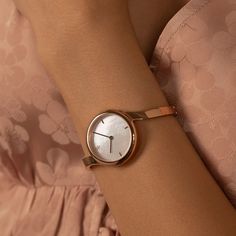 CLAIRE Pearl Watch in Rose Gold | VANNA Modern Watches With Rotating Bezel For Gift, Elegant Rose Gold Watch With Metal Dial, Elegant Rose Gold Watch With Round Dial, Timeless Rose Gold Quartz Watch, Elegant Rose Gold Round Watch, Timeless Rose Gold Jewelry And Watches With Round Dial, Timeless Rose Gold Watches With Bracelet Strap, Timeless Rose Gold Jewelry With Round Dial, Formal Rose Gold Jewelry And Watches With Metal Dial