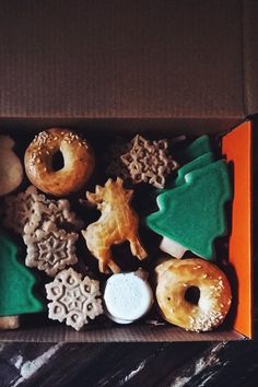 a box filled with different types of cookies