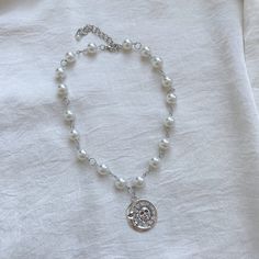 "Delicate white necklace with pearls. Pendant combines sun and moon🌞🌙 Jewelry findings are made of steel. ♡IMPORTANT: - Listing is for 1 necklace - Video without filters  ♡SIZE: - This necklace is made in 17.3\" length or 44 centimeters (adjustable) - The size of the choker is standard, but if you need a specific size, write it in the notes to the order or in a message. ♡GIFT - Gift for buying 2 or more items in our store ♡SHIPPING - I am sending from Bulgaria - We ship all orders with a track number and do expedited shipping, but due to the pandemic, orders delivery may still take longer time - Your item will be dispatched within 3 working days - Please see our shop policies for full details ♡COLORS: - Colors may vary due to filters, you can watch a video with natural daylight  ♡CARE - White Pearl Necklace With Metal Pendant, White Pearl Pendant Necklace In Metal, White Pearl Necklace With Alloy, White Round Pearl Necklace, Boho Hippie, White Necklace, Moon Jewelry, Pearl Pendant Necklace, Cute Necklace