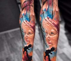 a man's leg with an artistic painting on it