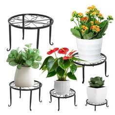 three plant stands with flowers and plants in them