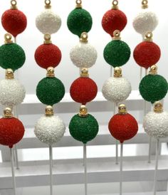 christmas ornament lollipops on a stick with red, green and white balls