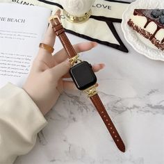 Luxury Slim Leather Apple Watch Band Elevate your Apple Watch with our genuine leather band designed for series 8, 7, 6, 5, 4, 3, and SE. This slim bracelet offers a touch of elegance and comfort, available in 38mm, 40mm, 41mm, 42mm, 44mm, 45mm, and 49mm sizes. Crafted with precision, this band combines functionality with style. The premium leather ensures durability and a luxurious feel against your skin. It's the perfect accessory for both formal occasions and everyday wear. With easy installa Modern Brown Watch Bands As Fashion Accessory, Trendy Leather Watch Bands With Bracelet Strap, Trendy Leather Watch Band, Elegant Leather Apple Watch Band As Gift, Trendy Leather Watch Band With Bracelet Strap, Trendy Leather Apple Watch Band As Gift, Trendy Brown Rectangular Watch Bands, Trendy Rectangular Leather Strap Watch Bands, Trendy Rectangular Apple Watch Band With Leather Strap