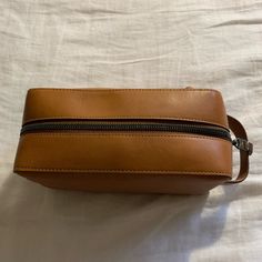 Nwt Leather Toiletry Bag - No Inner Pockets Measurements: 10 In X 5 In X 4 In Classic Soft Leather Bag In Camel, Brown Rectangular Bag With Removable Pouch, Tan Leather-lined Travel Bag, Tan Bags With Leather Lining For Everyday Use, Tan Leather Box Bag With Removable Pouch, Rectangular Case Bag With Leather Lining For Daily Use, Leather Rectangular Pouch For Daily Use, Rectangular Case Bag With Leather Lining, Brown Travel Box Bag Rectangular Case