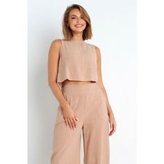 This crop top is perfect for the warm weather and all your summer nights out! The round neckline is flattering, while the back non functional buttons add a flirty touch. Plus, it has a relaxed fit so you can feel comfortable and confident no matter where you go! Petal And Pup, Summer Nights, Warm Weather, Round Neckline, Night Out, Short Dresses, Two Piece Skirt Set, Crop Top, Mini Skirts