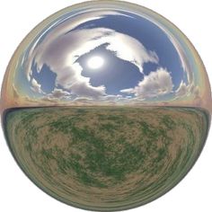 an image of the sky and clouds reflected in a ball